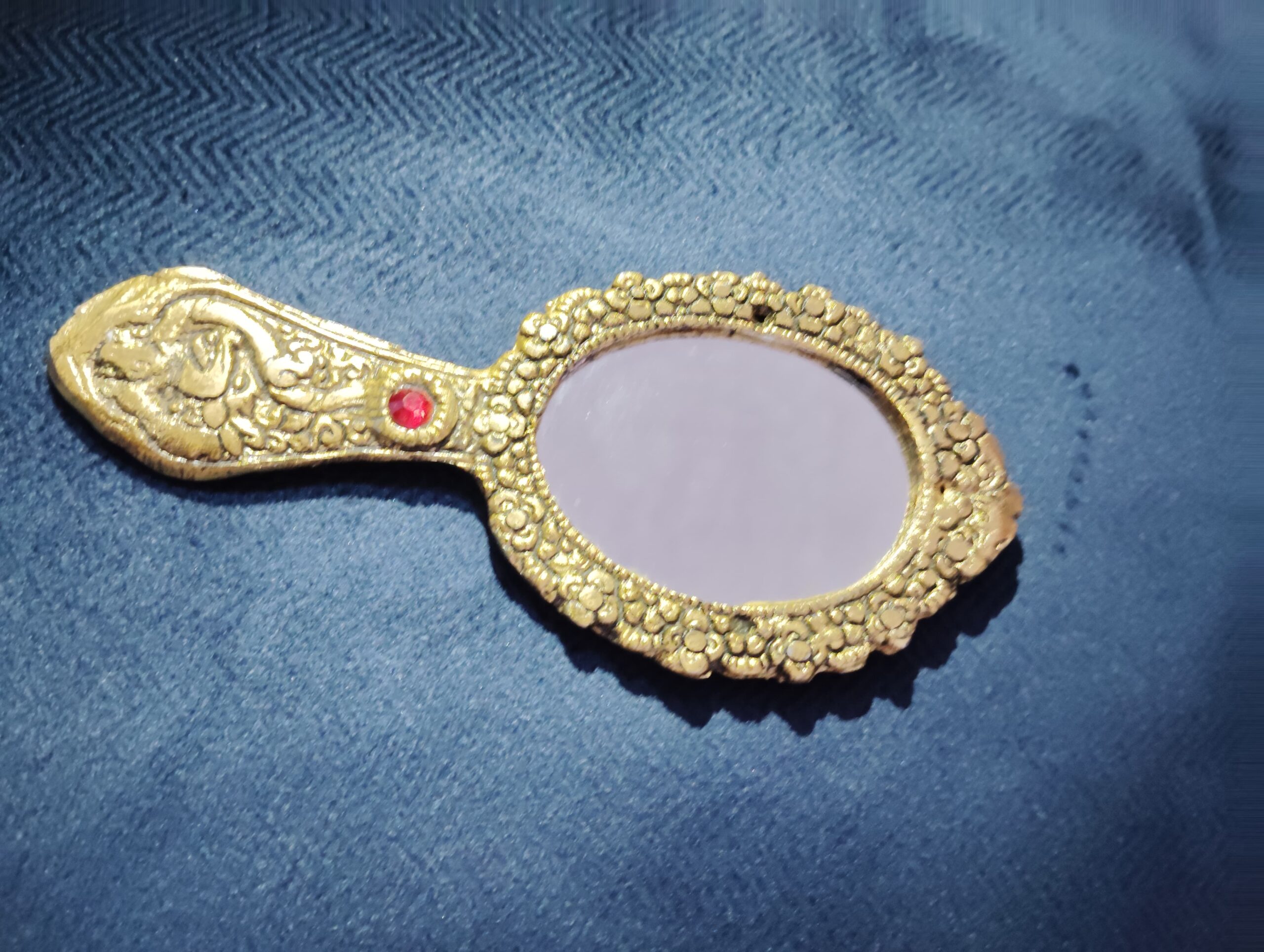 Antique Style Bronze Hand Mirror with Intricate Carvings & Red Gemstone